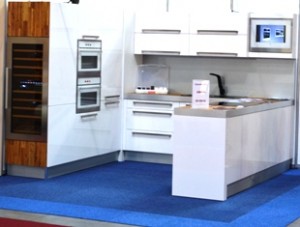 Kitchen design white body with wooden design for wine chiller long bar handle built in oven and microwave Czech Republic 300x227 Kitchen Designs by Inspired European Furniture and Home Designs: Furniture and Interior Design Fair in Exhibition Centre, Letnany