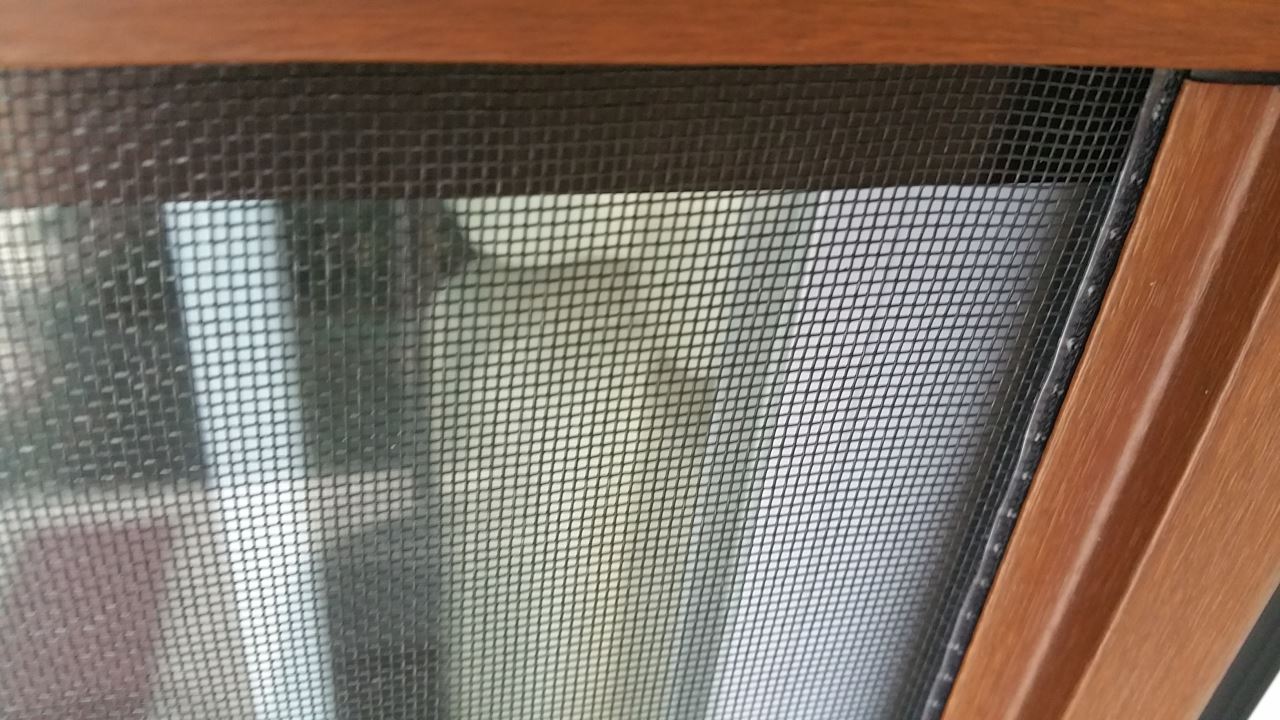 Mosquito Net Retractable Closed Net close net side view Singapore Prevent Dengue: Retractable Invisible mosquito / Insect Screen For Doors, Windows, Balcony, Patio, Terraces And Other Protection Areas Able To Install. 